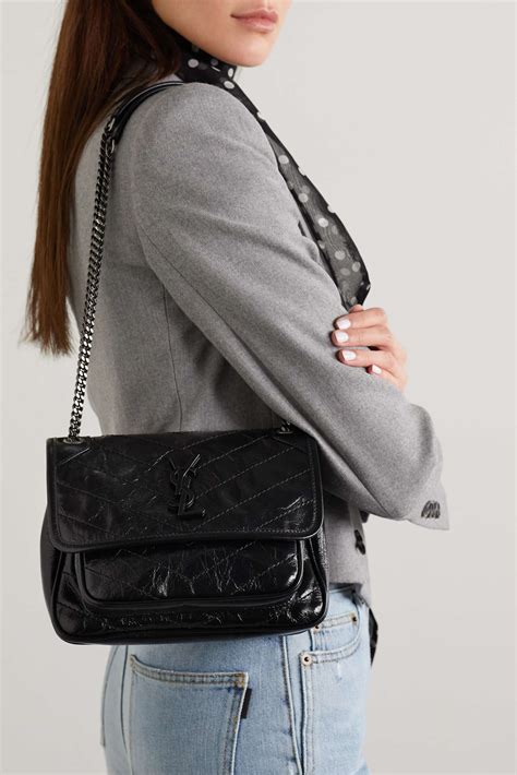 ysl niki baby black|Niki Baby leather shoulder bag in black .